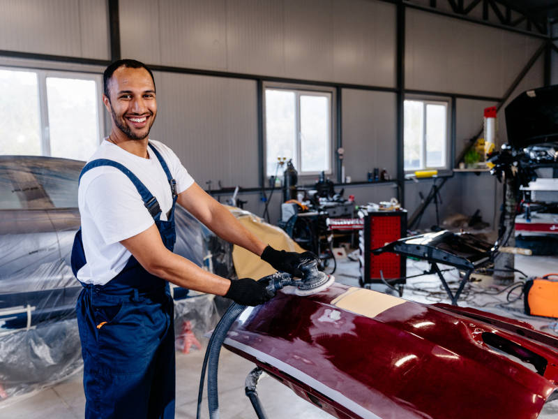 5 corners Isuzu Truck Technician smiling at the camera